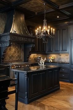 a large kitchen with an island and chandelier