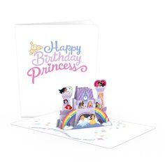 a birthday card with princess castle and rainbows on the front, in white background