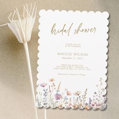 a bridal shower card with flowers on it