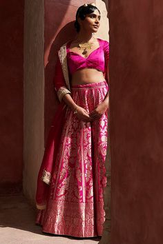 Pink silk banarasi lehenga with floral print. Paired with blouse and embroidered dupatta.
Component: 3
Pattern: Woven
Type Of Work: Floral
Neckline: Sweetheart
Sleeve Type: Short
Fabric: Satin and Katan Silk  and Organza
Color: Pink
Other Details: 
Embroidered border
Closure: Side zipper
Back open blouse
Occasion: Wedding - Aza Fashions Fitted Meenakari Lehenga For Traditional Ceremonies, Pink Banarasi Silk Sets For Transitional Season, Pink Meenakari Saree Set, Brocade Sets With Meenakari For Navratri, Brocade Meenakari Sets For Navratri, Fitted Brocade Lehenga With Meenakari Details, Pink Meenakari Choli For Eid, Eid Pink Meenakari Choli, Wedding Floor-length Sets With Zari Weaving