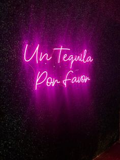 a neon sign that reads un tequila pon favor on the wall