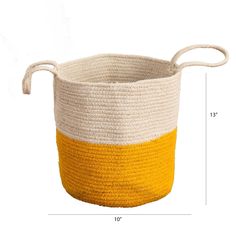 a large yellow and white basket is shown with the measurements for it's handles