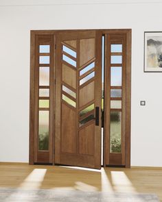 an open wooden door with glass panels on the inside and outside doors, in front of a white wall