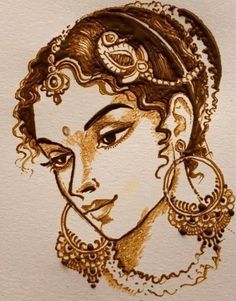 a drawing of a woman's face in gold and brown ink on white paper