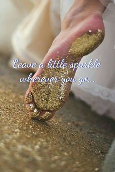 a person's feet with gold glitter on them and the words leave a little sparkle wherever you go