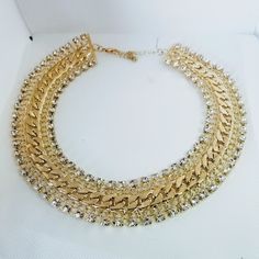 Beautiful Choker Necklace With Stonework Perfect For Any Occasion Brand New Gold Bib Necklace With Jewels For Party, Gold Bling Choker Necklace, Gold Jeweled Bib Necklace For Party, Gold Crystal Bib Necklaces For Party, Gold Crystal Bib Necklace For Party, Elegant Gold Bib Necklace With Rhinestones, Gold Crystal Choker With Clavicle Chain, Gold Chain Rhinestone Necklace For Parties, Gold Rhinestone Necklace With Chain For Party