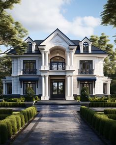 a large white house surrounded by hedges and trees