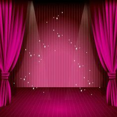 an empty stage with pink curtains and stars