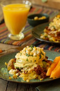 A green plate with smashed potato eggs benedict with corn hollandaise with a glass of orange juice. Eggs Benny Recipe, Potato Eggs, Benedict Recipe, Eggs Benedict Recipe, Meatless Main Dishes, Mexican Street Corn, Poached Egg, Street Corn, Smashed Potatoes