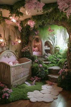 a baby's room is decorated with pink flowers and greenery in the corner