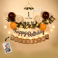 a happy birthday banner with balloons and garland on the wall in front of it is decorated with photos