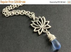 EASTER SALE Lotus Flower Necklace. Silver Lotus Necklace. Lotus Flower Charm Necklace. Lotus Charm Necklace. Silver Necklace. Handmade Neckl by TheTeardropShop from The Teardrop Shop. Find it now at https://ift.tt/1SdRKVd! Flower Necklace Silver, Lotus Flower Necklace, Silver Flower Necklace, Lotus Necklace, Flower Charm Necklace, Charm Necklace Silver, Flower Charm