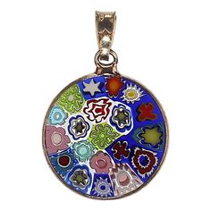 This is part of Chairish’s Fine Jewelry assortment.  Bright and Beautiful Millefiori Glass Pendant – 19mm Gold-Plated Sterling Silver Setting  Embrace the vibrant colors of Spring with this stunning Millefiori pendant. The 19mm pendant features exquisite Millefiori glasswork, a centuries-old Italian technique known for creating distinctive floral patterns on glass. The colorful glass elements are beautifully encased in a sleek gold-plated sterling silver setting, adding a touch of luxury to the Silver Murano Glass Round Necklace, Silver Murano Glass Round Pendant Jewelry, Silver Murano Glass Round Pendant Necklace, Murano Glass Round Jewelry For Gift, Multicolor Polished Round Jewelry, Multicolor Round Jewelry With Polished Finish, Multicolor Murano Glass Jewelry, Multicolor Round Necklaces With Charms, Multicolor Cabochon Round Pendant Jewelry