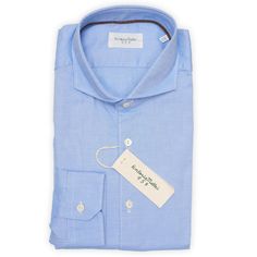 NEW Original Retail Price: €140 Solid Blue Color Slim Fit 100% Cotton Oxford Fabric Spread Collar Standard Cuff Made In Italy Measurements: Neck: 15" Chest: (Pit to Pit x2) 40" Back Length: 29" Sleeve Length: 25" This product is located in our EU warehouse. Fitted Light Blue Dress Shirt For Spring, Blue Fitted Shirt With Fold Down Collar, Fitted Blue Shirt With Fold Down Collar, Blue Fitted Dress Shirt With Fold Down Collar, Fitted Blue Dress Shirt With Fold Down Collar, Fitted Blue Collared Shirt, Blue Dress Shirt For Summer Daywear, Blue Shirt With Fold Down Collar For Spring, Blue Spring Shirt With Fold Down Collar