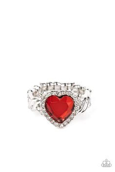 A faceted red heart gem is pressed into a silver heart frame studded with dainty white crystals for a romantic centerpiece atop the finger. Textured twists dotted with similar dainty crystals climb up the sides of the ring for additional sparkle. Features a dainty stretchy band for a flexible fit.

 Sold as one individual ring. Textured Twists, Cupid Ring, Romantic Centerpieces, Heart Gem, Stretchy Rings, Red Ring, Red Rings, Silver Heart Ring, White Crystals