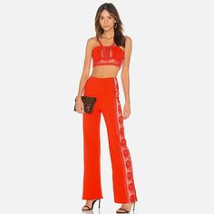 Super Fun Right Red/Orange Pant And Crop Top Set By Free People. Lace Detailing On The Top And Down The Side Of The Pants. Originally $350 For The Full Set. Worn Once. Some Marks At The Bottom Of The Hem On The Pants. Measurements Of The Pants When Laying Flat: Rise: 12" Waist:12.5" Inseam: 32.5" Width Of Pant Opening:11" Free People Set, Crop Top Pants Set, Free People Jumpsuit, Red Trousers, Orange Pants, Floral Print Pants, Sweatsuit Set, Lace Pants, Spandex Top