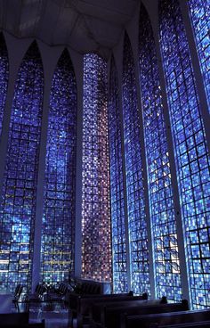 the inside of a church with stained glass windows