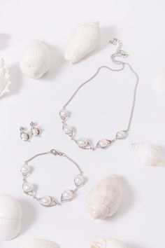 Our freshwater pearl 5 station necklace is a beautiful addition to any collection. This versatile piece can be dressed up or dressed down for any occasion. Detailed Necklace, Station Necklace