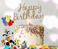 a birthday cake with mickey mouse and other characters on it, surrounded by confetti and balloons