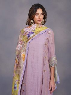 Adorned with thread and sequin work this A-line suit is paired with a contrasting printed dupatta and tissue hem elasticated pyjamas Color: Lavender Fabric: Tissue, Chanderi & Cotton Embroidery / Work Details: Sequins and thread work Note: Wash Care - Dry Clean only The product will be delivered within 3-4 weeks of order placed Relaxed Fit Printed Salwar Suit Designs, Suits For Women Indian, Lavender Fabric, Salwar Suit Designs, Printed Dupatta, Indian Dresses Traditional, A Line Kurta, Smart Outfit, Dupatta Set