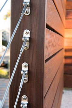 a close up of the handles on a wooden dresser