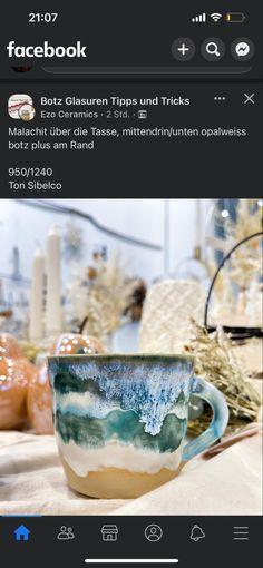 a coffee cup sitting on top of a table