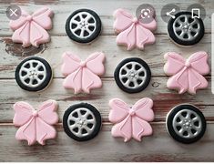 decorated cookies in the shape of wheels and bows