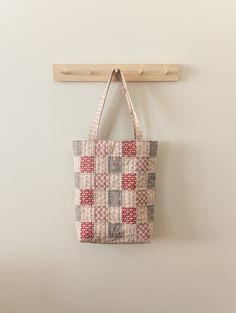 'Tis the season for curling up with a cup of warm tea and a favorite book! And Amy @ritualquiltcompany used the Mansfield Park fabrics to capture the cozy vibes and make the Reversible Riley Tote!⁠
⁠
This simple tote pattern features an updated rectangular gingham pattern on one side and a single fabric on the reversible side. Visit our blog for a link to the pattern and all of the fabric details from this timeless collection! Mrs Norris, Red Prints, Mansfield Park, Simple Tote, Gingham Pattern, Fashion Project, Cozy Vibes