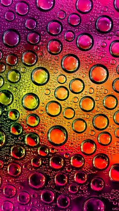 water drops on the glass with different colors