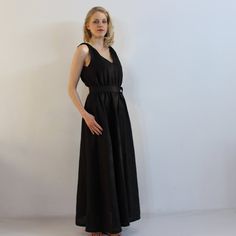 "Spring dress. Write the selected color in the message Long black linen dress with belt, sleeves and 2 pockets , perfect for casual wear and suitable for any occasion in any season Details: - 100% natural linen produced in Europe ; - medium weight (180 gram per square meter); - color: black, could be any from our colors catalog (color samples at the photo); Made to order, approximately a few days, If you have any questions please message me and I will be glad to answer. Size guide : Size XS Bust Chic Black Linen Dress, Black Belted Maxi Dress For Summer, Elegant Belted Linen Maxi Dress, Chic Linen Belted Maxi Dress, Black Linen V-neck Midi Dress, Elegant Black Linen Maxi Dress, Chic Belted Linen Maxi Dress, Chic Black Linen V-neck Dress, Chic Black V-neck Linen Dress