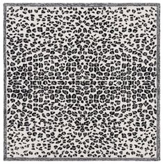 a black and white animal print rug