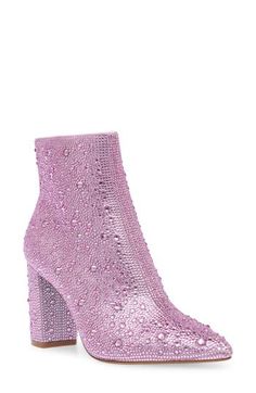 Instantly elevate any outfit with these fabulous pointy toe booties covered in a symphony of glittering crystals. 3 1/5" heel 5 1/5" shaft height Side zip closure Rhinestone and textile upper/textile lining/synthetic sole Imported Pink Booties, J Cole, Pink Rhinestones, Nice Shoes, Betsey Johnson, Bootie, Light Pink, Heel Height, Ankle Boot