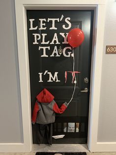 a door with a sign that says, let's play tag i'm'm