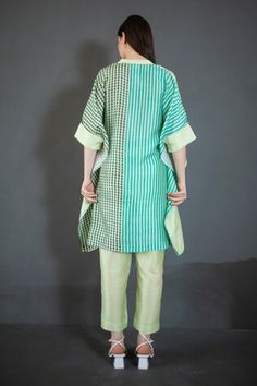 Light green asymmetric kurta with abstract floral, checks, line print on front, back and asymmetric hemline. Paired with a check print straight pant. - Aza Fashions Green Silk Sets For Spring, Green Silk Kurta For Summer, Asymmetric Kurta, Line Print, Women Kurta, Dupion Silk, Green Abstract, Set Women, Pant Set