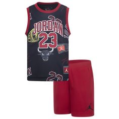 Gear up your little boys for playdates, sensory classes, and everything beyond with the Jordan 23 Printed Jersey Set. A cute tribute to greatness, this two-piece set completes your little ones’ look with a sleeveless top and matching shorts. The top boasts a crew neck for a snug feel and a Jordan logo on the chest to add an iconic hoop flair to your kiddos’ look. The shorts feature an elastic waistband and a Jumpman logo on the leg to help your little powerhouses make adorably dynamic moves in c Playful Sports Cotton Sets, Sporty Cotton School Sets, Black Graphic Print Playwear Sets, Black Graphic Print Sets For Playwear, Red Cotton Sports Set, Red Casual Playtime Sets, Sporty Red Playwear Set, Red Sporty Playwear Sets, Red Sporty Playtime Sets