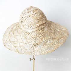 Made from natural undyed open weave strip straw and twisted jute braid, this capeline has a nice big brim so you can make the summer hat of all summer hats! They all have their own personality, some are more closely woven, some have more colour variation. A true sign that each one is unique and ultimately handmade. Capeline measures: Flat measurement from crown tip to brim: 30.4cm (12 inches) Brim width from side crown to brim edge: 11cm (4.3 inches) *Please note that this is not a finished hat Handwoven Artisan Hat For Spring, Artisan Handwoven Spring Hat, Eco-friendly Toquilla Straw Hat For Spring, Natural Palm Leaf Straw Hat For Spring, Natural Woven Boater Hat With Curved Brim, Artisan Woven Panama Hat For Spring, Artisan Woven Straw Hat For Spring, Spring Straw Hat With Open Weave And Flat Brim, Spring Curved Brim Straw Hat With Open Weave