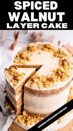 a cake that has been cut into pieces with the words spiced walnut layer cake on top