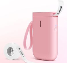 a pink electric toothbrush holder next to a roll of toilet paper on a pink background