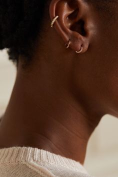 Maria Tash's interest in jewelry began at an early age when she attended a design course with her mom. This dainty 18-karat rose gold earring is detailed with 0.06-carats of pavé diamonds - meticulously placed to catch the light from every angle.  Shown here with: [IRO Blouse id732668], [Maria Tash Earring id724336], [Maria Tash Earring id724338], [Maria Tash Earring id724334], [Maria Tash Earring id724342], [Maria Tash Earring id724330]. Rose Gold Diamond Hoop Earrings, Maria Tash Earrings, Gold Diamond Hoop Earrings, Maria Tash, Rose Diamond, Rose Gold Earring, Cartilage Jewelry, Matthew Williamson, Design Course