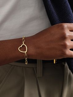 Jennifer Meyer's bracelet is strung with a dramatic 'Open Heart' charm that centers the design. It's been handmade in Los Angeles from 18-karat gold and features the label's medium size 'Edith' chain that's ideal for stacking. Elegant Everyday Heart Bracelet With Charms, Elegant Gold-tone Heart Bracelet, Elegant Heart Bracelet With Charms, Modern Yellow Gold Jewelry For Valentine's Day, Elegant Yellow Gold Open Heart Bracelet, Luxury Valentine's Day Bangle Jewelry, Gold-tone Bracelets With Heart Charm As A Gift, Luxury 14k Gold Bracelet For Valentine's Day, Elegant Tarnish Resistant Bracelets For Valentine's Day