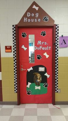 a door decorated to look like a dog's house