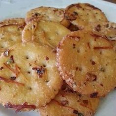 some crackers are sitting on a white plate