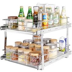 two tiered spice rack with spices, condiments and bottles on the bottom shelf