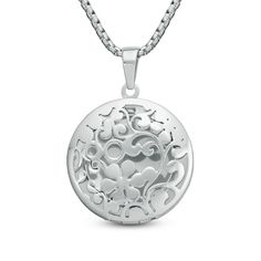 Fresh and flirty, this charming locket is just her feminine style. Created in sleek stainless steel, this round locket is topped with an intricate cut-out floral pattern that catches the eye. The locket opens to reveal space for a small photo or memento. A look she'll treasure, this locket is polished to a brilliant shine and suspends along a 24.0-inch rolo chain that secures with a durable lobster claw clasp. Circle Locket, Floating Diamond Necklace, Round Locket, Solitaire Necklace, Ruby Necklace, Solitaire Necklaces, Local Jewelry, Solitaire Pendant, Round Cut Diamond