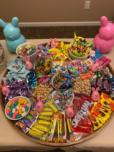 a table topped with lots of candy and candies