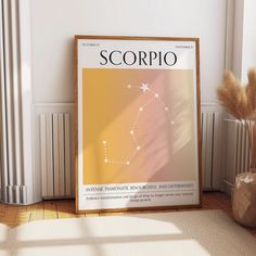 a poster with the zodiac sign scorpio on it in front of a window