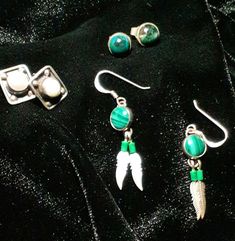 Lot of pierced sterling earrings. Malachite Dangle with feathers, Freshwater pearls st in silver base, and Azurite cabochons. All 3 sets are marked 925. Total weight is 6.9 grams. Spend $35 in my shop and shipping is free. I specialize in Sterling Silver jewelry, my items are all estate jewelry. Most items are antiques from Victorian to the 1980's. Occasionally items are more recent and those are noted as prior to 2005. Most Antique & Vintage Items will show wear & imperfections consistent with Azurite Malachite, Sterling Earrings, Estate Jewelry, Jewelry Earrings Studs, Antique Vintage, Sterling Silver Earrings, Freshwater Pearls, Sterling Silver Jewelry, Feathers