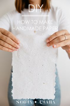 a woman holding up a piece of paper with the words how to make handmade paper