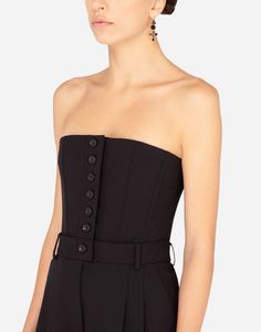 This strapless stretch wool jumpsuit by Dolce&Gabbana combines tradition and modernity, resulting in a timeless elegant piece. The bustier shape accentuates feminine silhouette, making it perfect choice for those who want to enhance their beauty. Made from high-quality wool, offers both style comfort. Strapless Fitted Jumpsuits And Rompers For Gala, Formal Fitted Strapless Jumpsuit, Elegant Strapless Jumpsuits And Rompers, Elegant Strapless Jumpsuits And Rompers For Gala, Elegant Strapless Jumpsuit For Gala, Fitted Strapless Jumpsuit For Cocktail Occasions, Elegant Fitted Bandeau Jumpsuits And Rompers, Elegant Fitted Strapless Jumpsuits And Rompers, Elegant Strapless Fitted Jumpsuits And Rompers