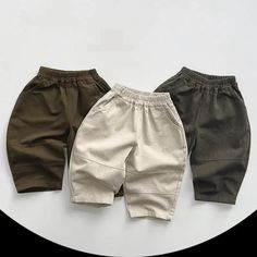 Introducing our Casual Solid Children's Trousers, the perfect blend of style and comfort! 🌟 Made from high-quality cotton, these loose-fit trousers are designed to provide unrestricted movement for your little ones. With their elastic waist closure, these harem pants ensure a secure and comfortable fit. The mid-waist design and solid pattern add a trendy touch, while the practical pockets add convenience. Suitable for ages 1-6 years, these unisex trousers are a must-have for any fashion-forward Non-stretch Solid Cotton Cargo Pants, Casual Non-stretch Cotton Chinos, Non-stretch Cotton Casual Chinos, Solid Cotton Cargo Pants For Spring, Casual Cotton Harem Pants Pull-on Style, Non-stretch Cotton Cargo Pants, Baggy Solid Cotton Chinos, Non-stretch Khaki Cotton Harem Pants, Solid Cotton Wide-leg Chinos